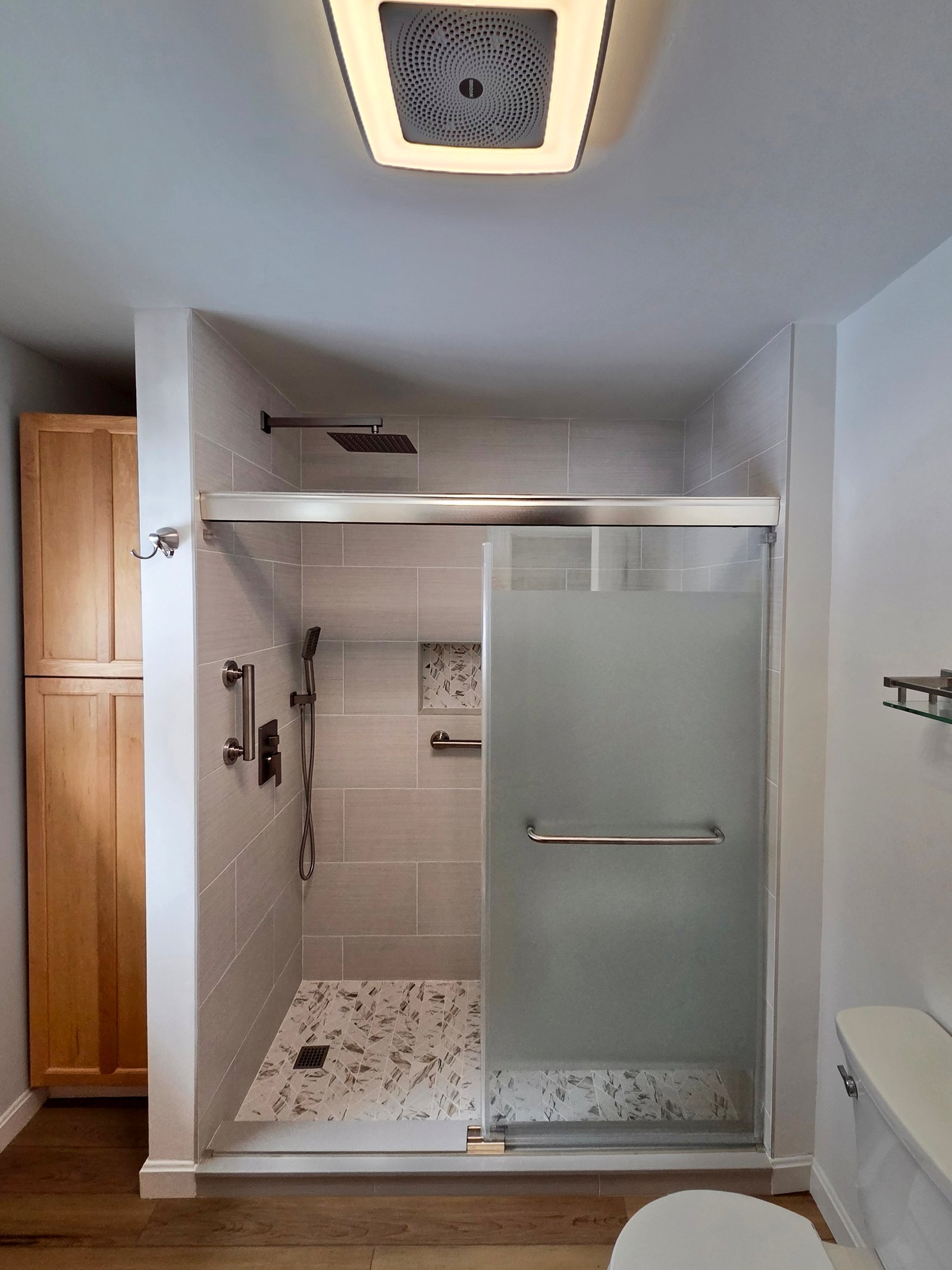 A room with finished wooden floors and trim